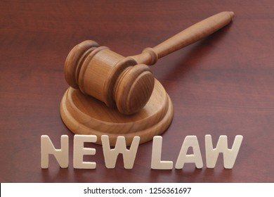 किस तरह के कामों को माना जाता है आतंकवाद? नए कानून में दी गई परिभाषा 1 KSHITITECH words new law wooden judge 260nw 1256361697 KSHITITECH